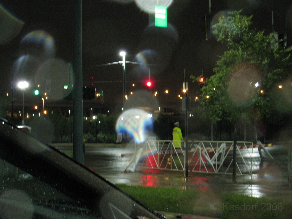 Flying Pig 2009 0305.jpg - The only other person around other than the trash can guy... a lonely wet policeman waiting for some traffic to direct.
